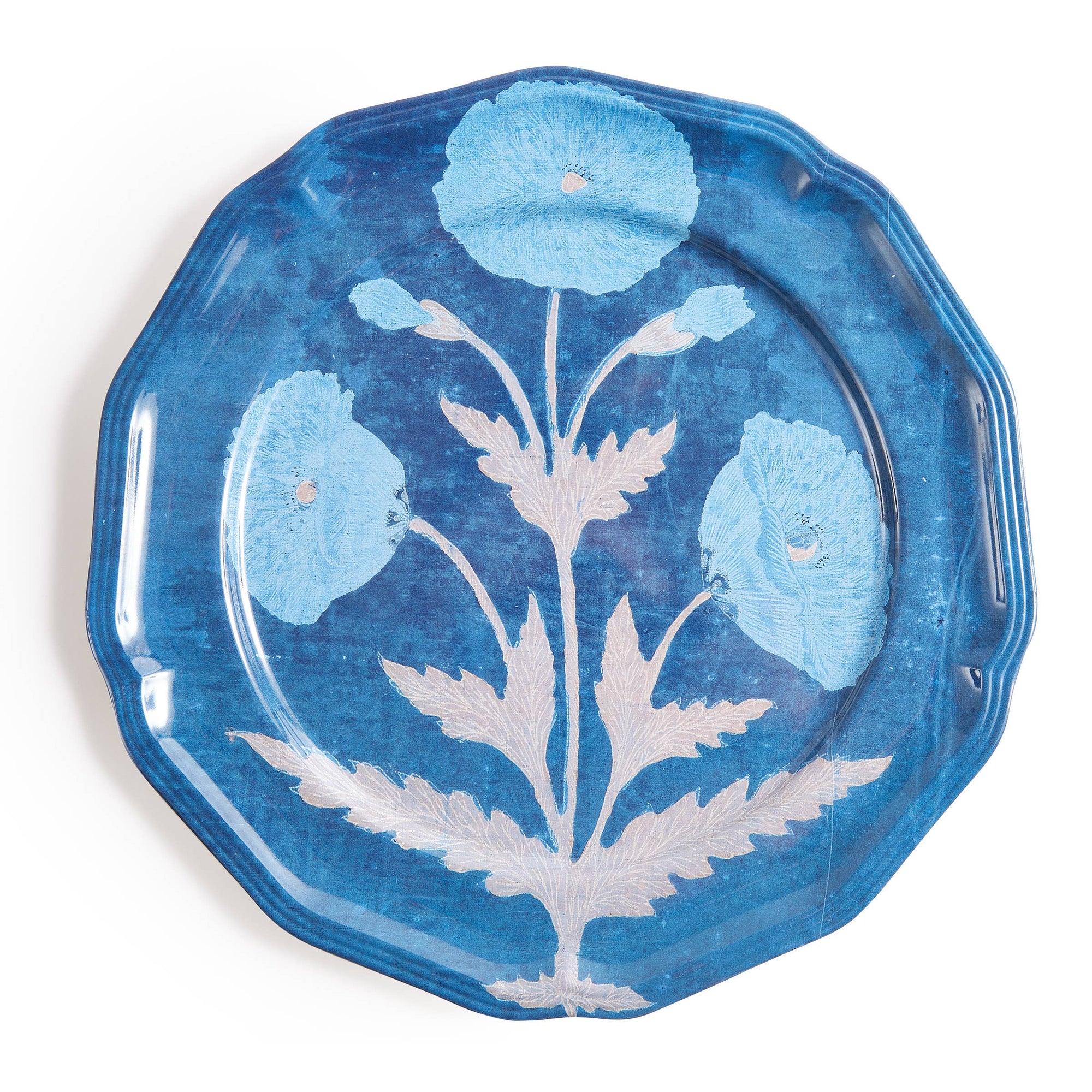 Blue melamine plate with floral design on a white background