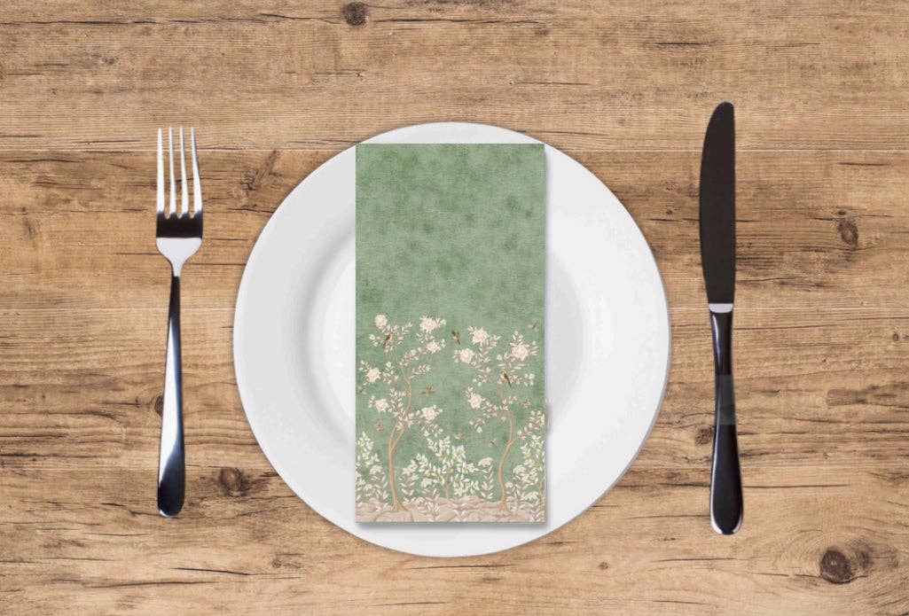 Sage forest design printed guest towel on plate with flatware 