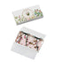 A box of La Rose aime la Menthe Botanical Palets with two palets visible, one with a pink rose design on the top and the other with a floral pattern. The product is vegan, handcrafted in France, and features rose and spearmint scents.