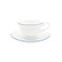 Tea cup and saucer with royal blue trim on white background 