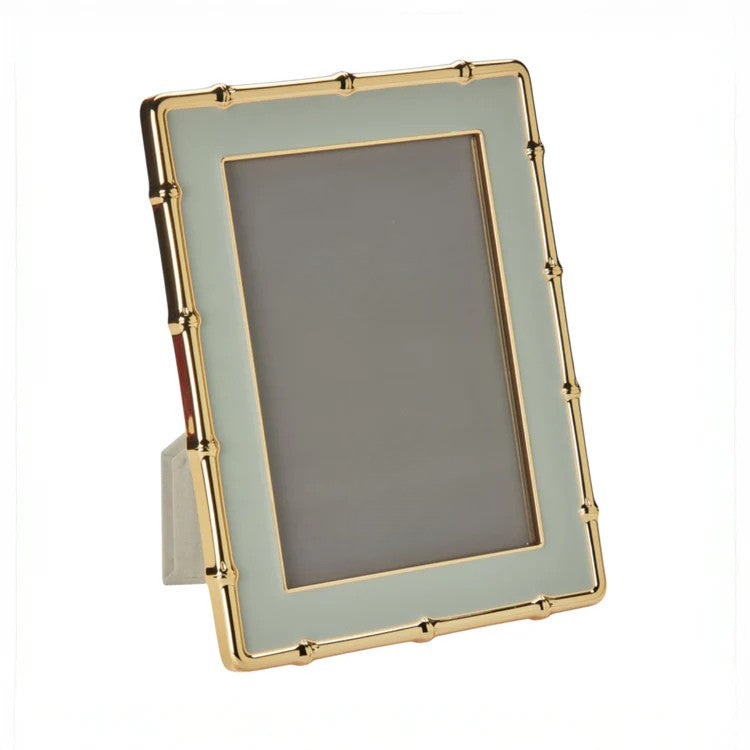 Picture frame with sage and gold bamboo enamel on white background 