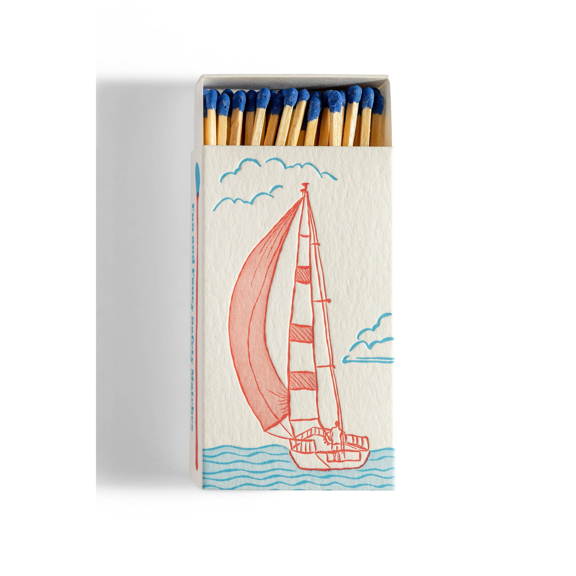Matchstick box with sailboat printed on box on white background 