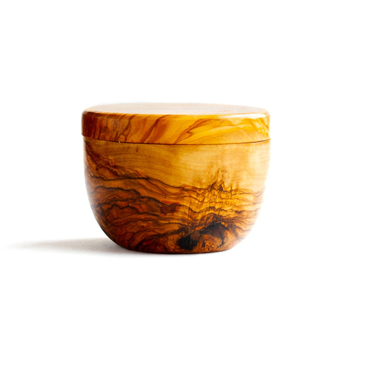 Olive wood salt cellar with swivel top on white background 