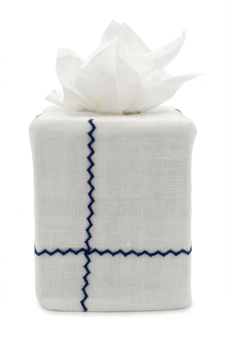 Tissue box cover with white tissue on a white background