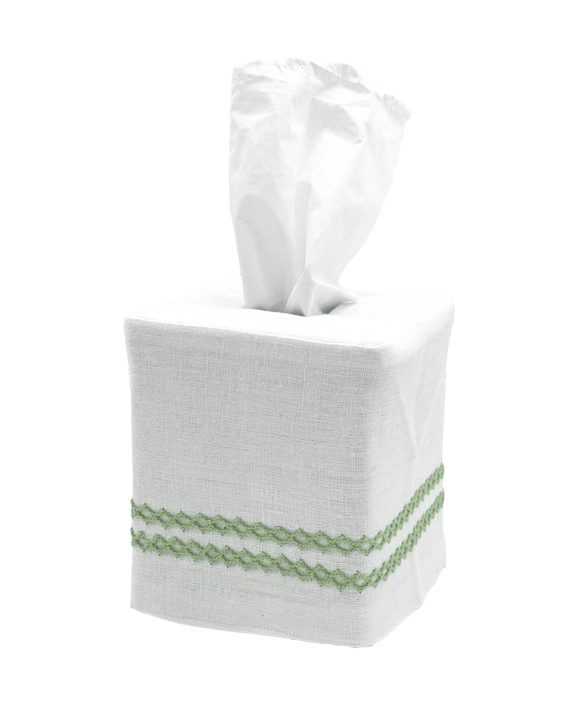 White tissue box cover with green trim on a white background