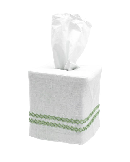 White tissue box cover with green trim on a white background