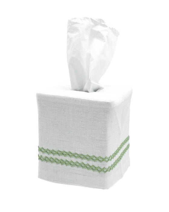 White tissue box cover with green trim on a white background