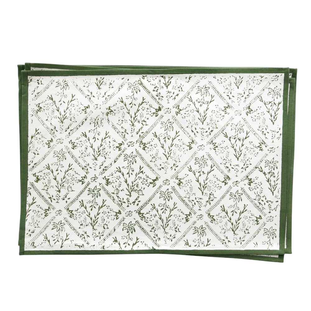 Homeport Sea Ferns &amp; Domino hunter green placemats featuring a botanical fern pattern on a white background.