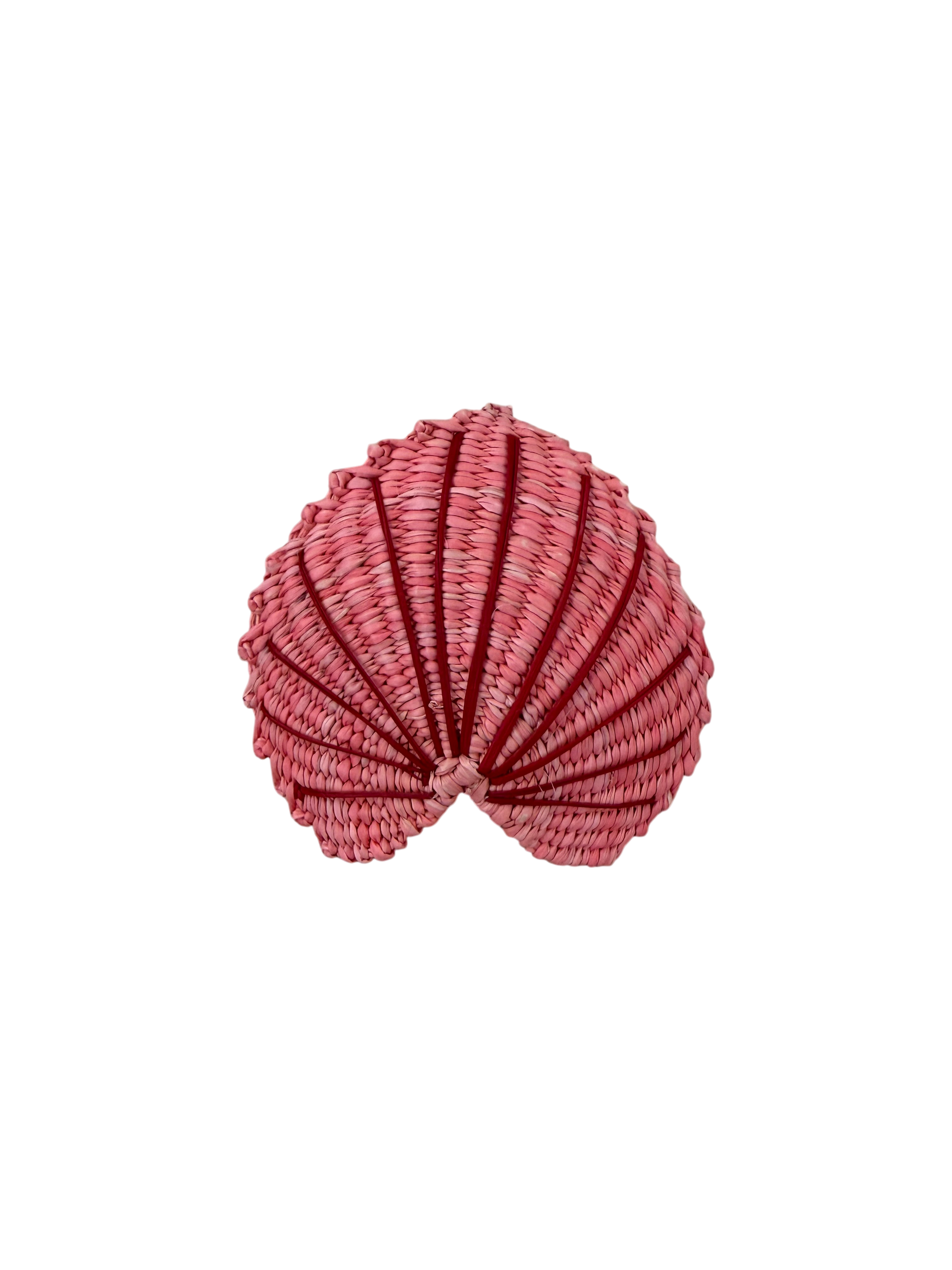 A pink woven seashell-shaped hair accessory with a textured, ribbed pattern, isolated on a white background.
