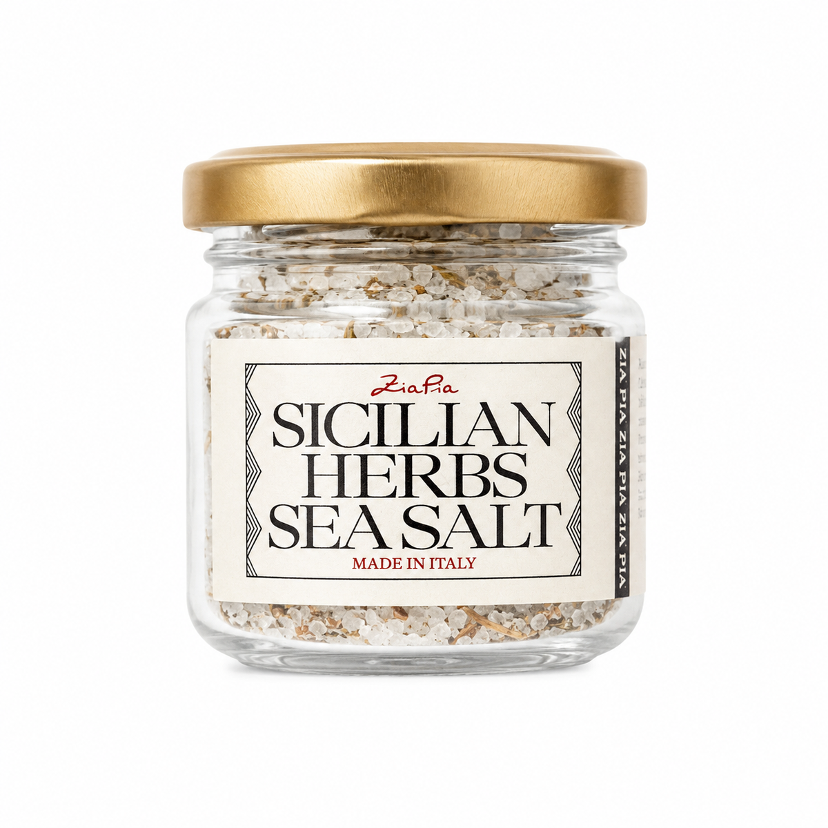 Italian sea salt with herbs in glass jar on white background 
