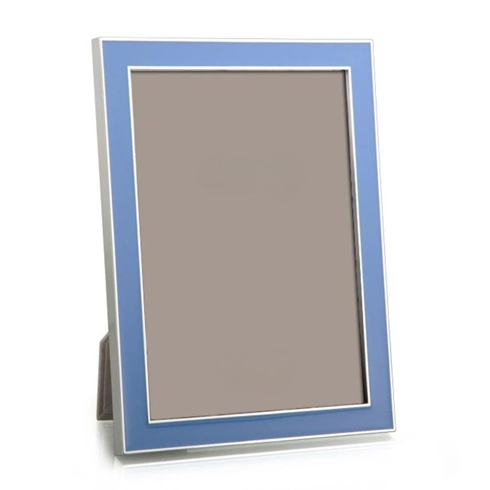 Periwinkle blue enamel frame with silver trim on white background 