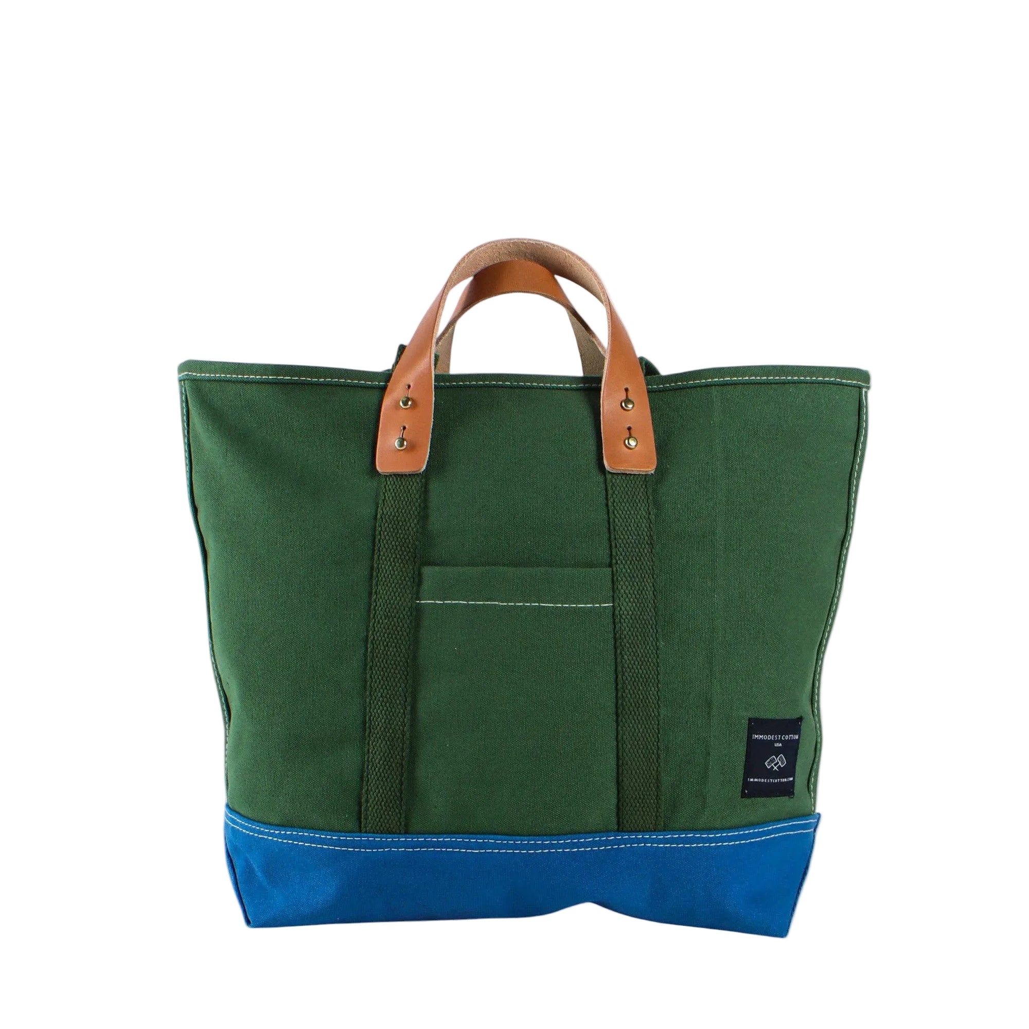 A green canvas tote bag with brown leather handles and a blue bottom base, shown against a plain white background.