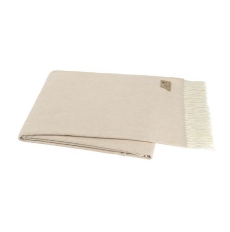 Beige blanket with white fringe on a white background