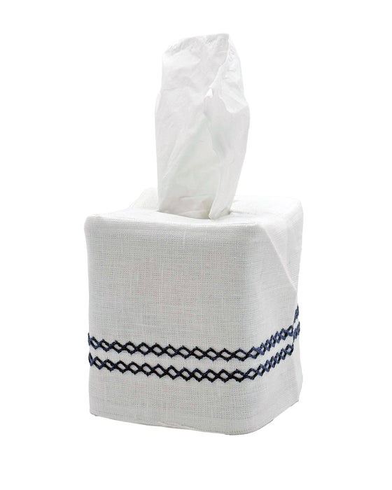 White tissue box cover with navy blue picot embroidery pattern on a white background