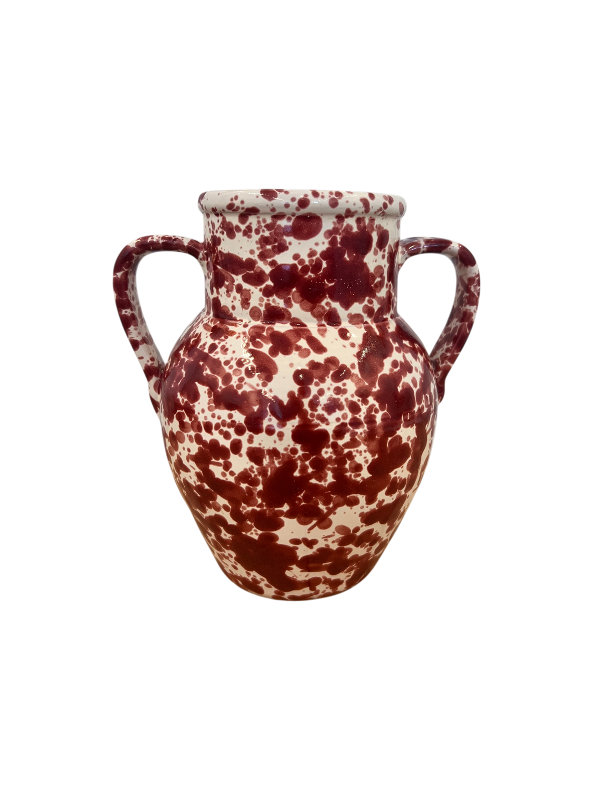 A ceramic vase with two handles, featuring a speckled glaze pattern of deep red on an off-white background, isolated on a white background.