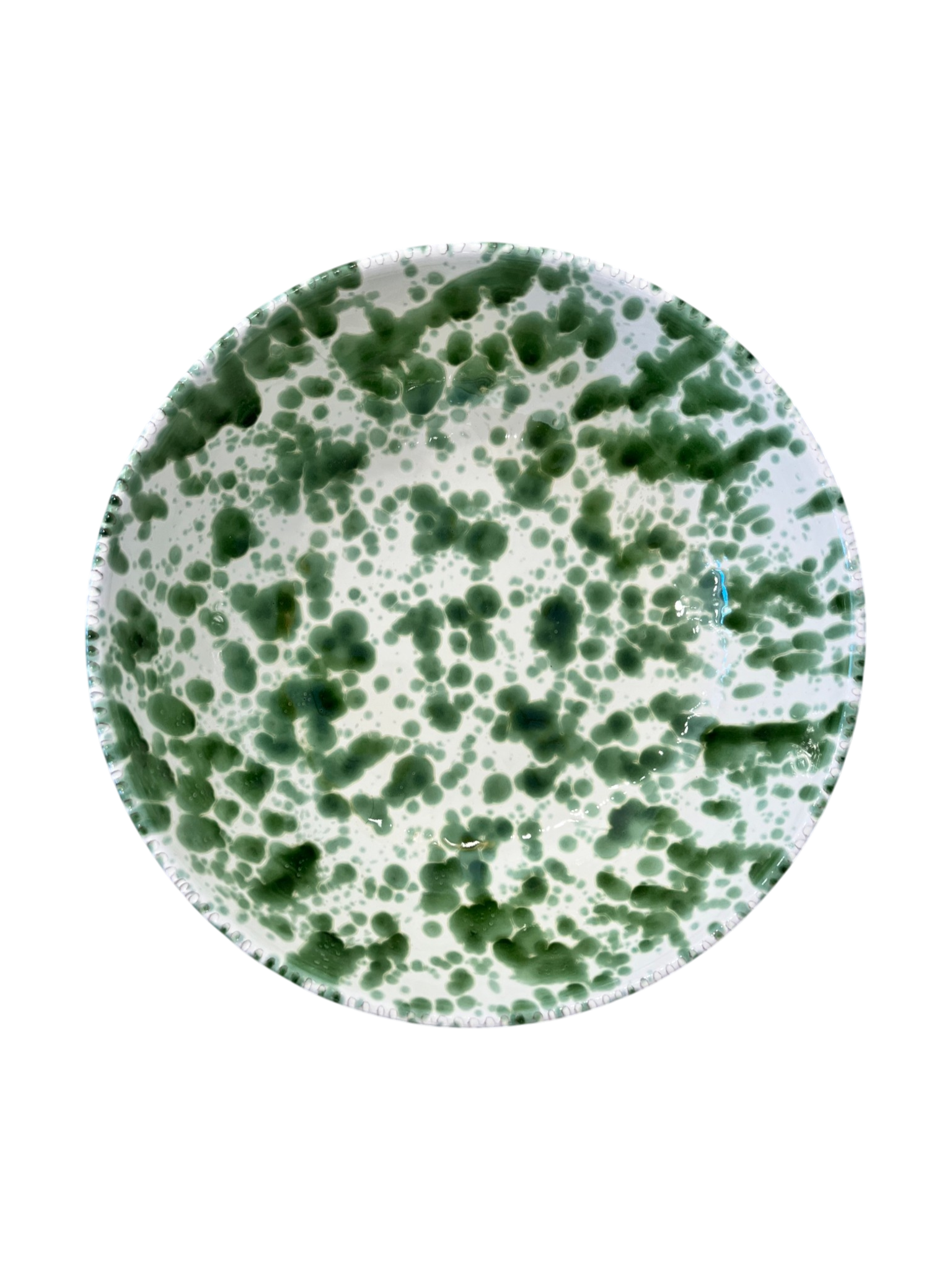 A round ceramic plate featuring a green and white speckled, hand-painted pattern, shown against a plain white background.