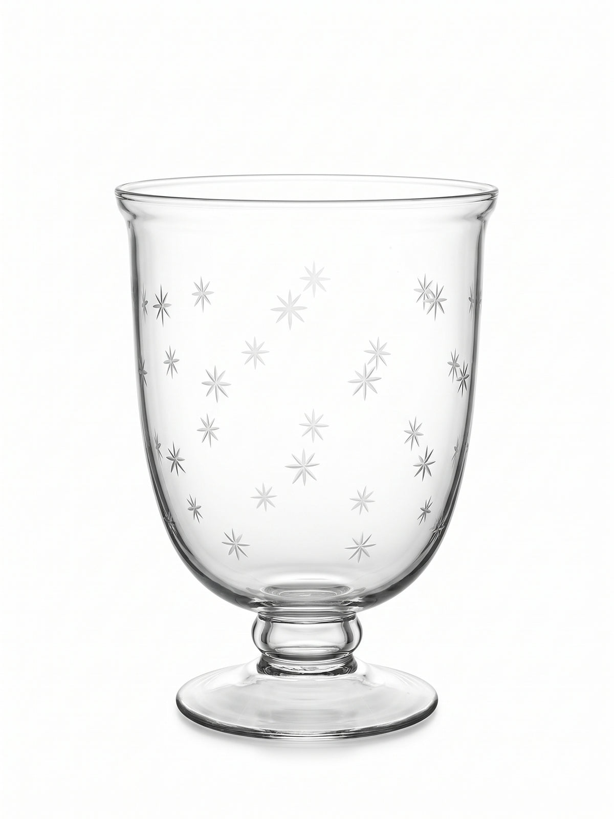 A clear glass goblet or candle holder with a flared rim and pedestal base, decorated with etched silver starburst patterns, shown on a plain white background.