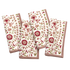 Set of 4 folded napkins in block print with green and blush florals with hemmed finish 