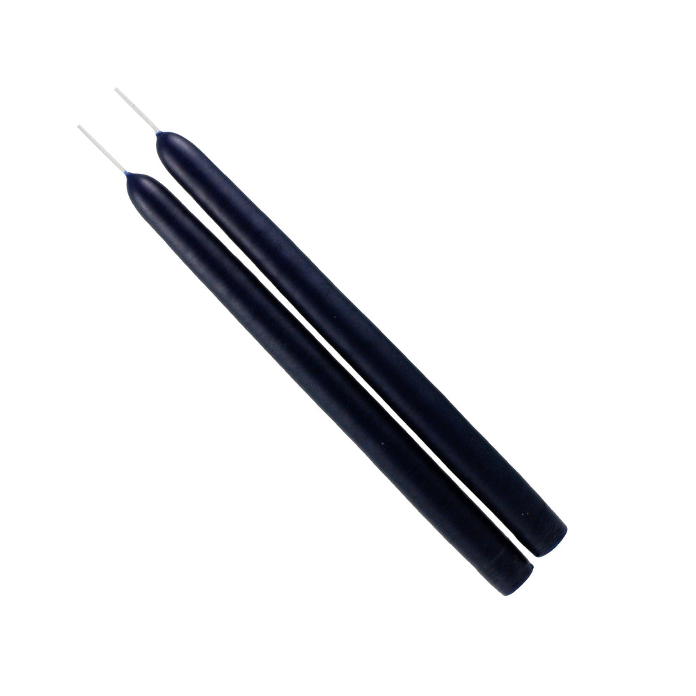 2 Navy taper candles on white background 