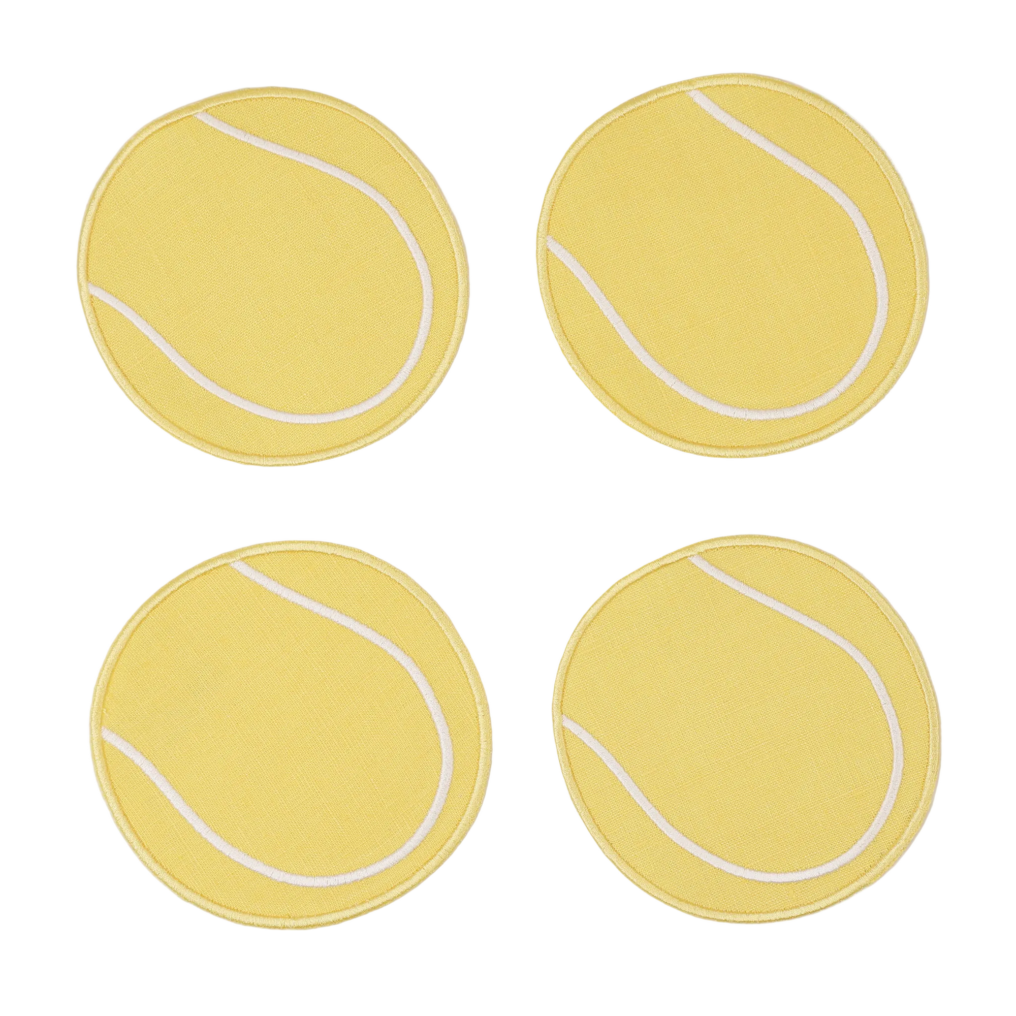 Four yellow coasters with white lines resembling tennis balls on a white background