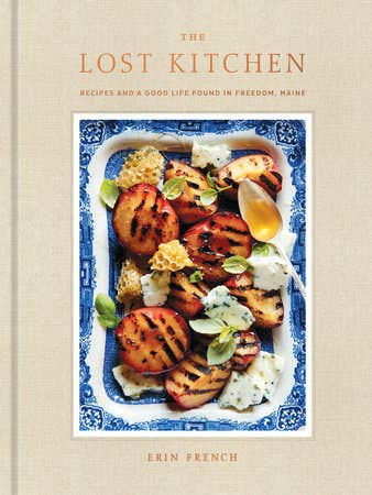 Cover of the Lost Kitchen cookbook by Erin French with dish of peaches on front cover 