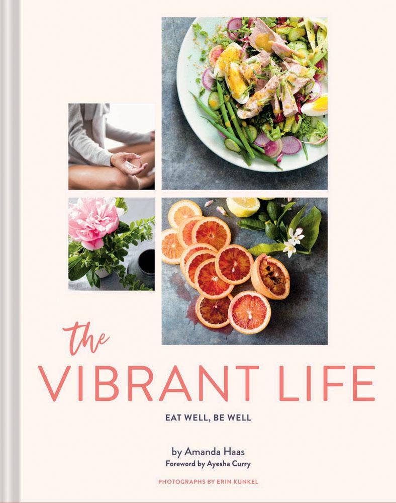 Cover of the Vibrant Life Cook book with fruit, food and flowers by Amanda Haas 