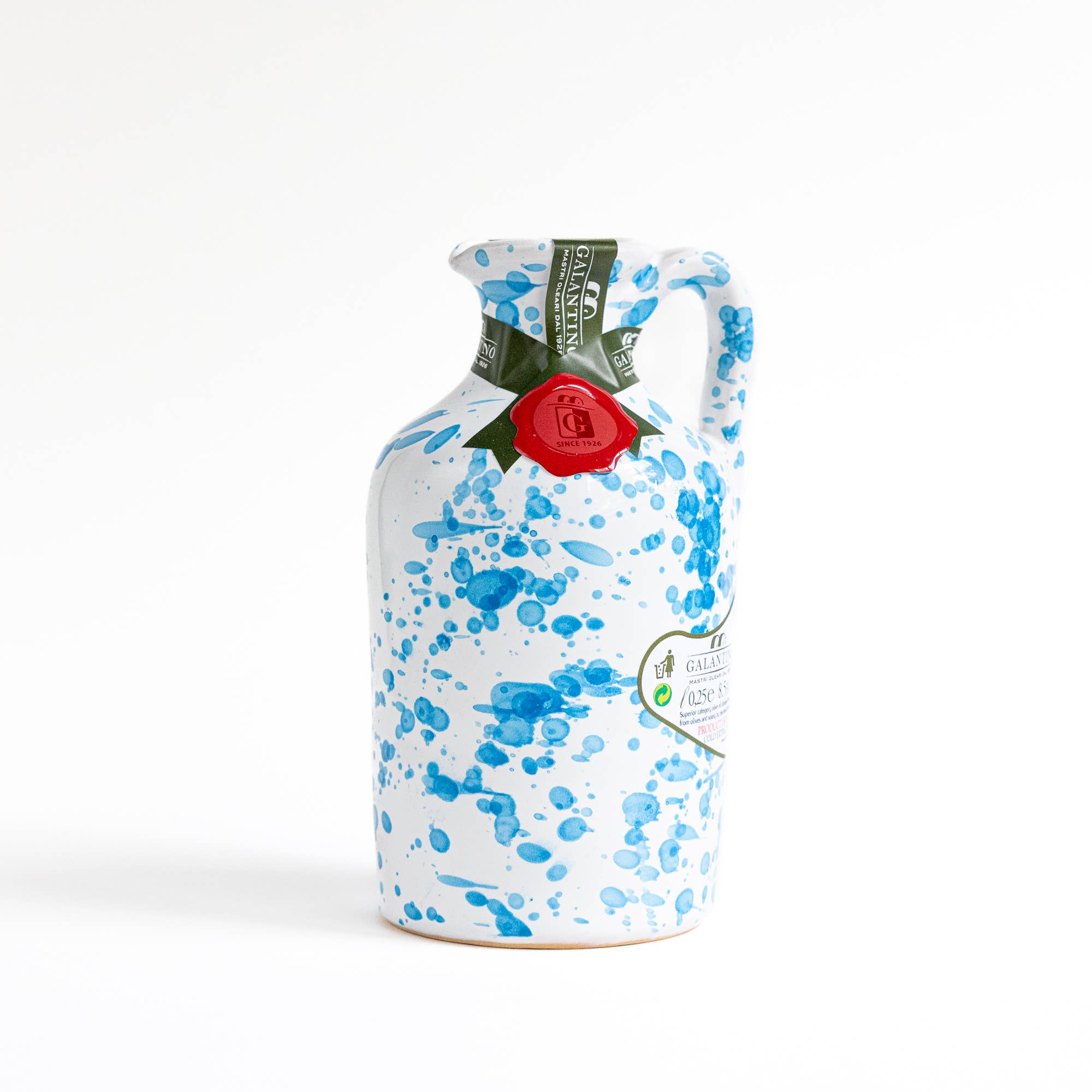 Tourquoise splatter ceramic bottle of olive oil 