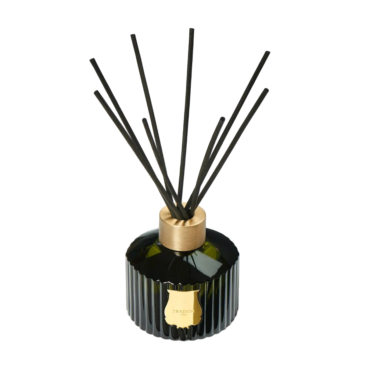 Black and gold reed diffuser on a light gray background