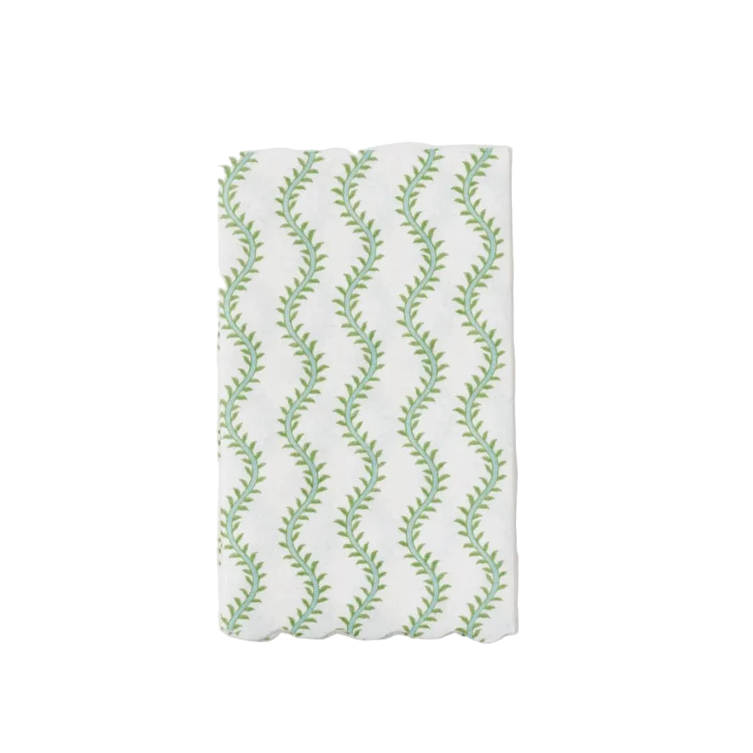 Fabric with green leaf pattern on a white background
