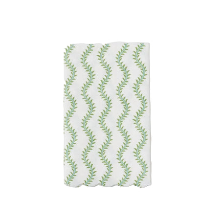 Fabric with green leaf pattern on a white background
