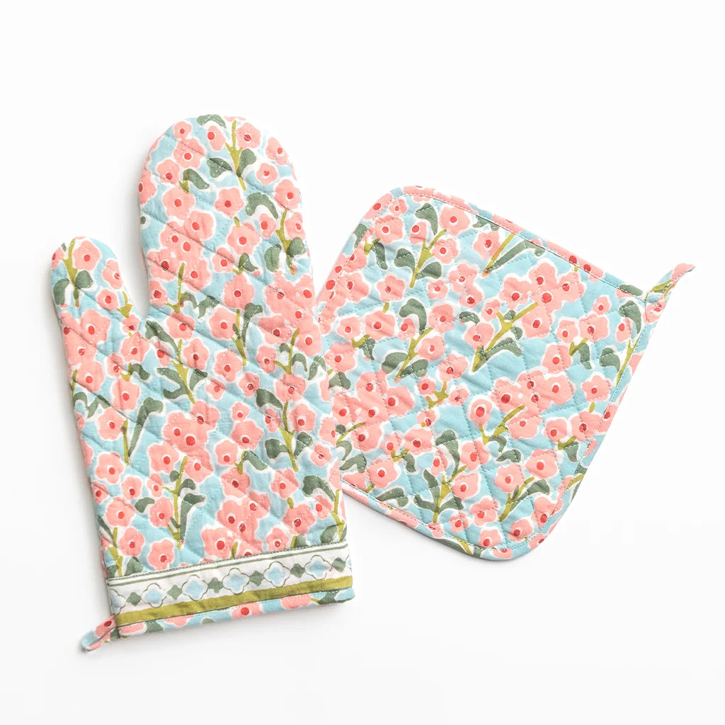 Floral oven mitt and pot holder set on a white background