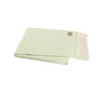 Light green blanket with white fringe on a white background