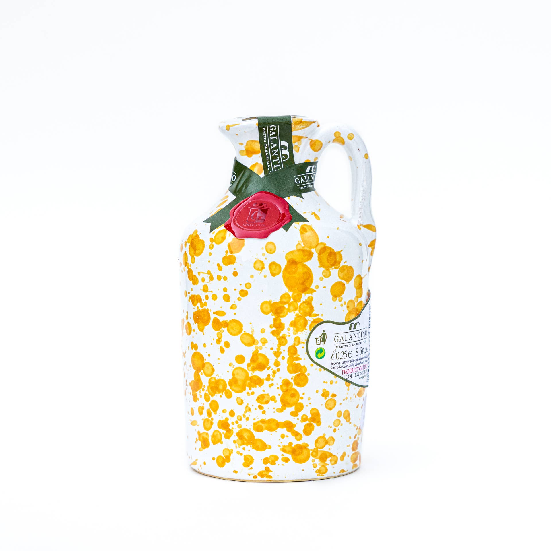 Yellow splatter ceramic bottle of extra virgin olive oil with cork on white background 