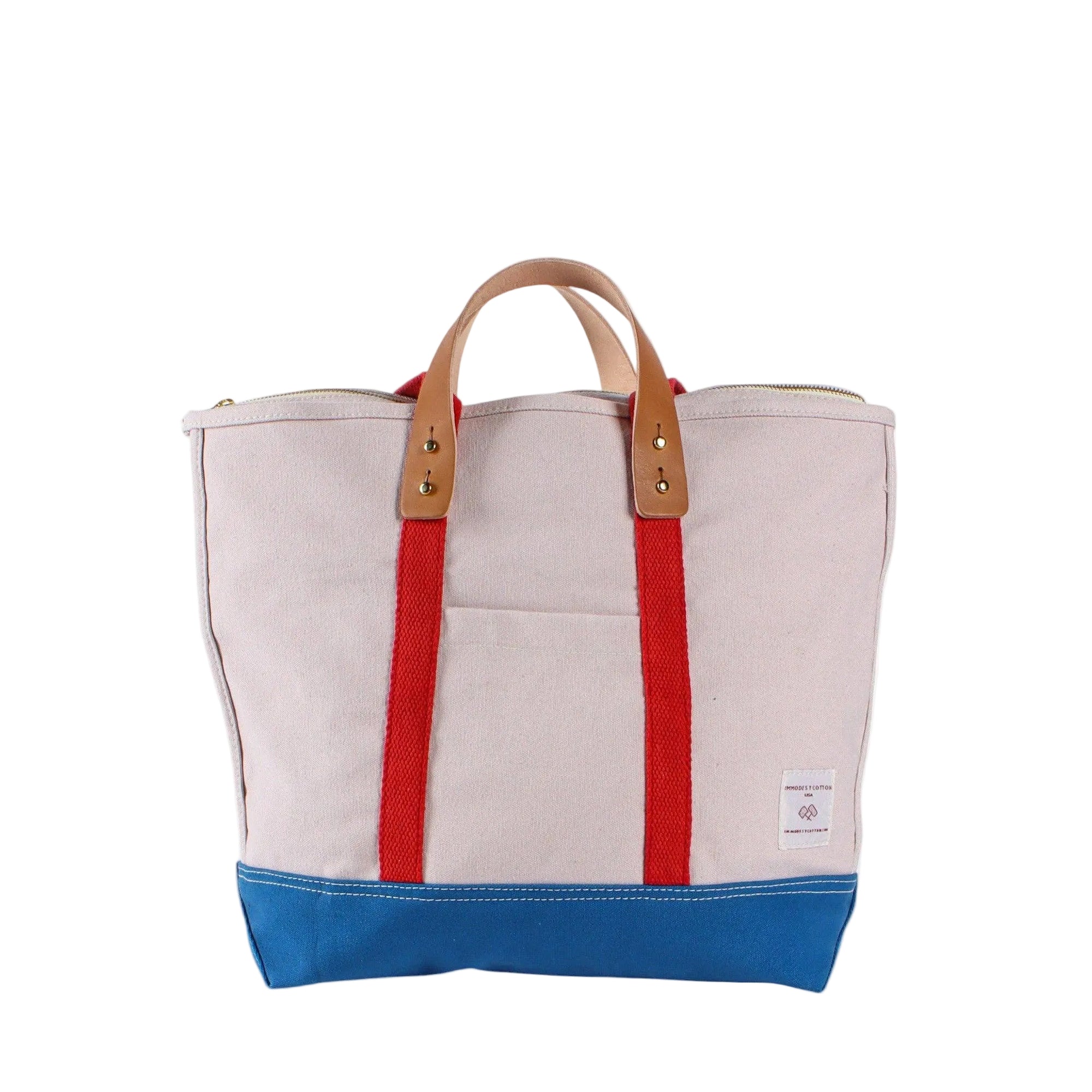 Sky canvas zipper tote with detachable leather handles on white background 