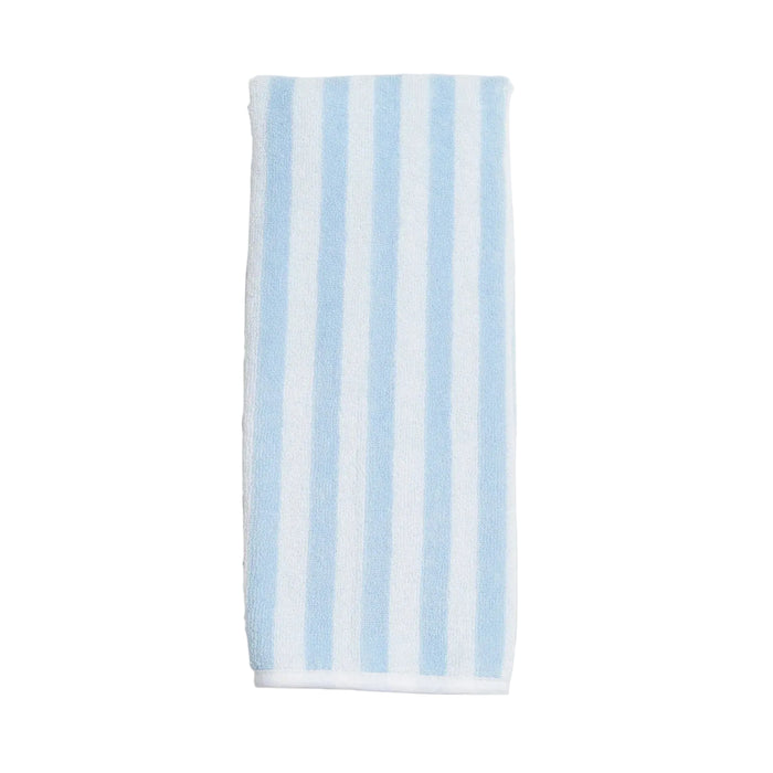 Striped towel with blue and white stripes on a white background
