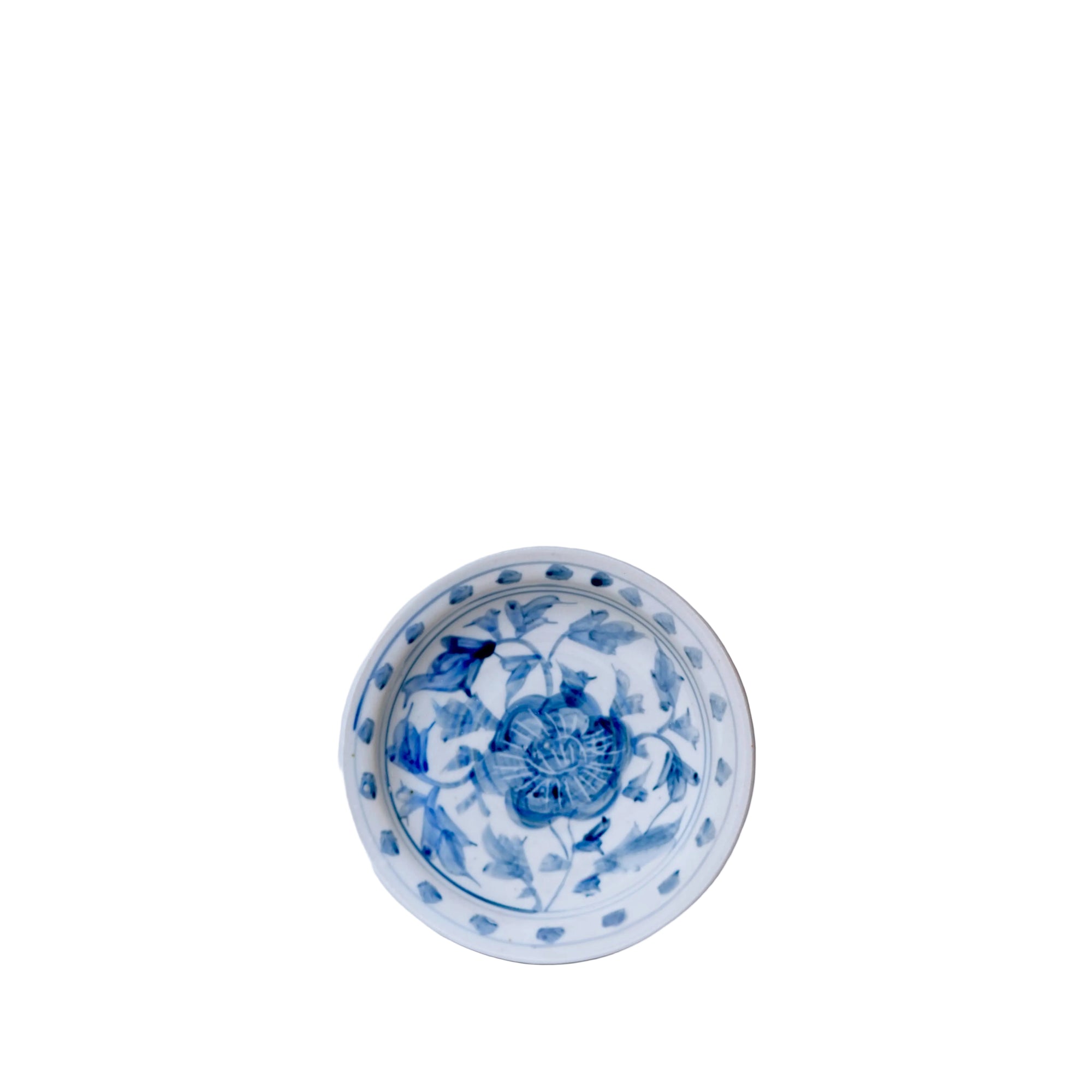 Ceramic bowl with blue floral design on a white background