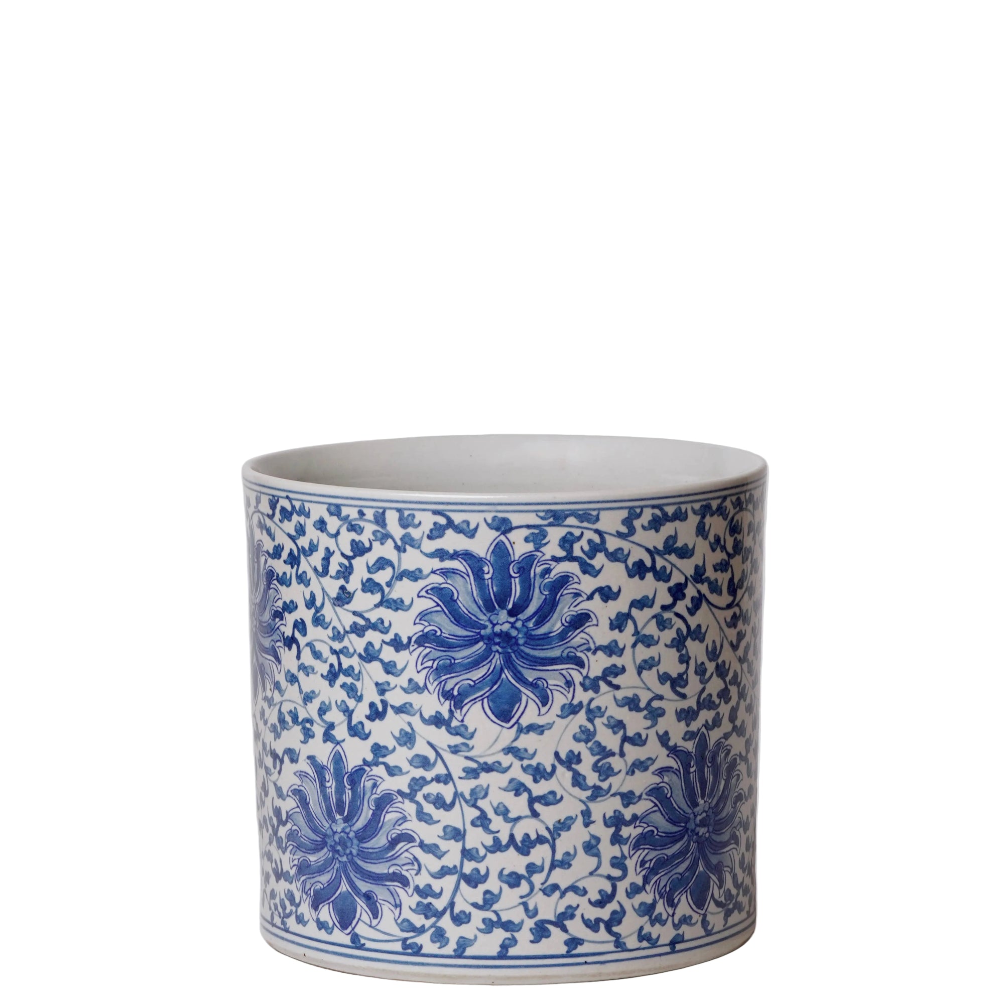Ceramic pot with blue floral pattern on a white background