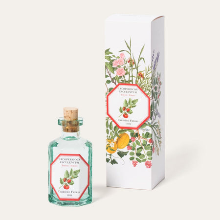 Bottle of 'Exsperimium Excellentum' with decorative label and matching box on a white background