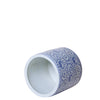 Ceramic vase with blue and white pattern on a white background