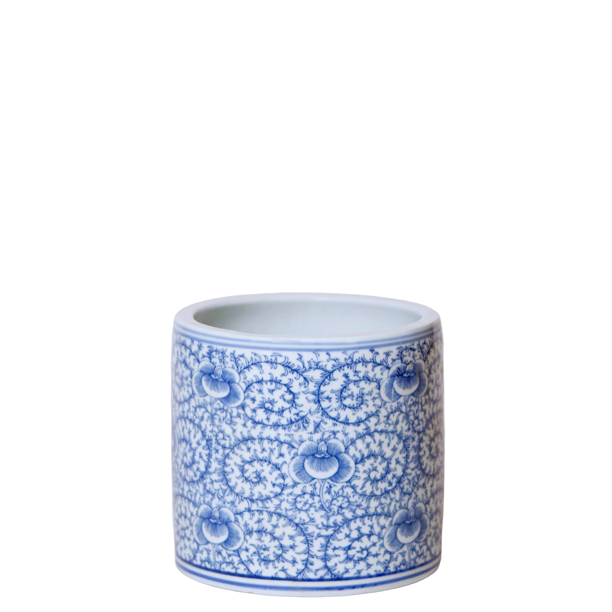 Blue and white ceramic container with intricate patterns on a white background