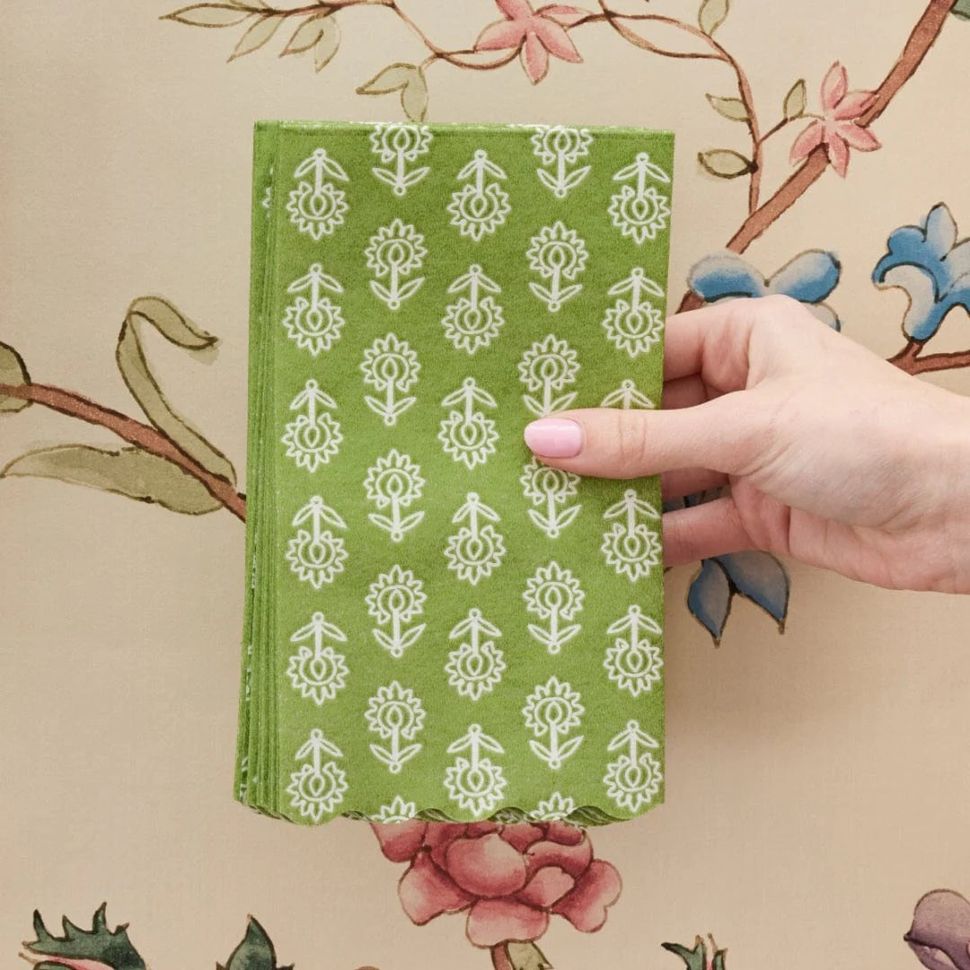 Paper napkins with green tullie print with floral background 