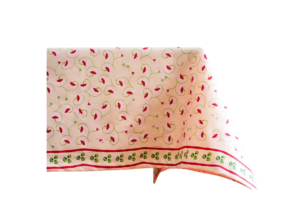 La Leccia tablecloth with light pink flowers and green steps and olive border