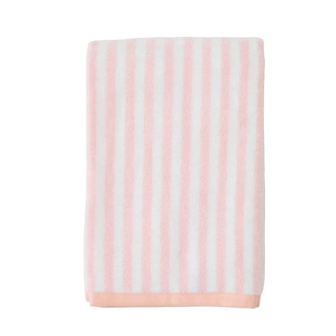 Striped towel with pink and white stripes on a white background