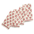 Set of red kitchen towels with red pattern on a gray surface