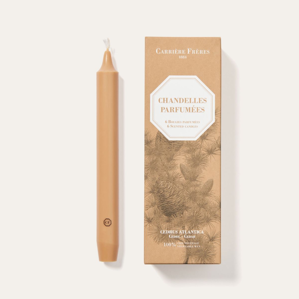 Perfume candle and its packaging on a white background